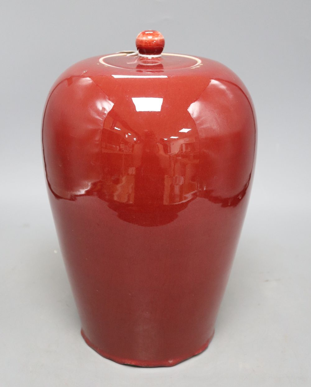A 19th century Chinese flambe vase and cover